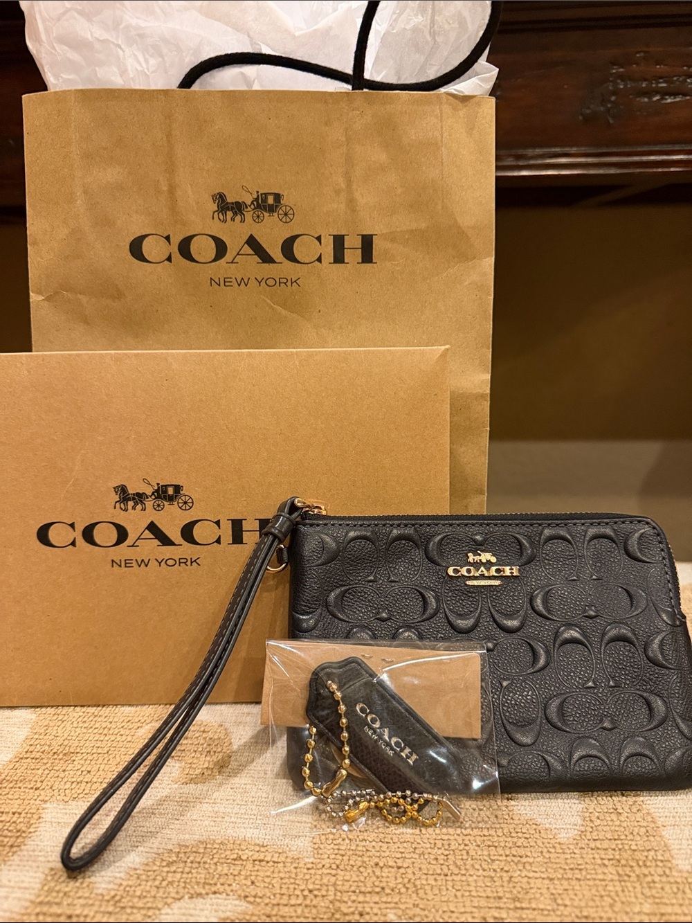 Coach Black Embossed Signature Leather Wristlet with Gold Logo